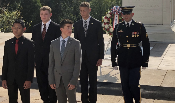 Photo of Jack Basil (back row, center), a rising junior at TMI Episcopal, takes part in a July 27 wreath-laying ceremony at the Tomb of the Unknown Soldier at Arlington National Cemetery in Virginia.